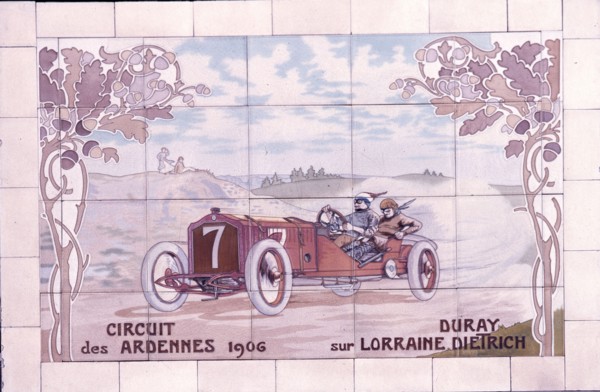 Decorative tile of famous racing car of the time which used Michelin tyres