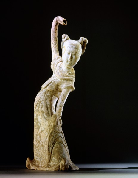 Unglazed pottery figure of a dancing woman