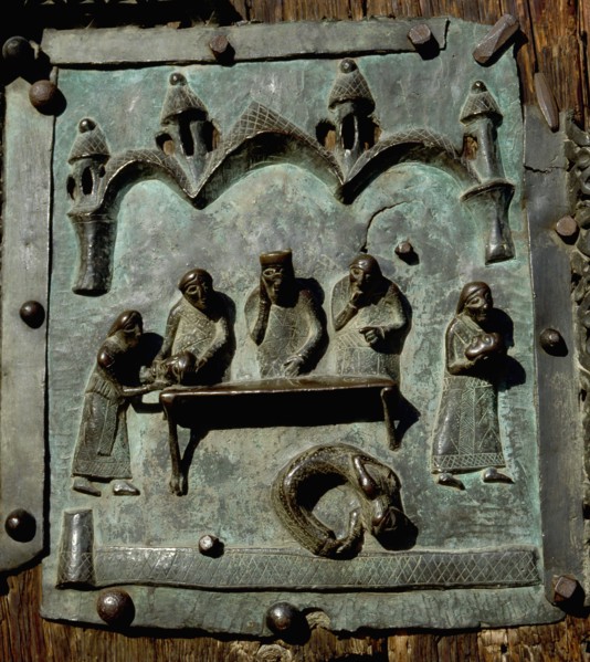 Detail of the bronze door of the Basilica of San Zeno which is decorated with 48 panels illustrating biblical stories and the lives of St Peter, St Paul, St Zeno, St Helena among others, and items con...
