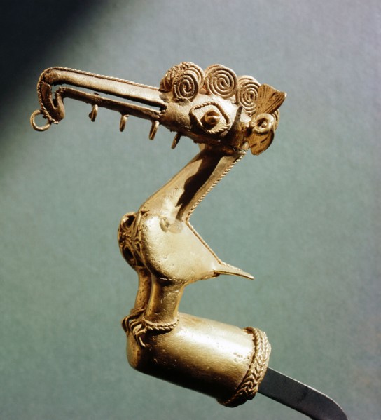 Gold piece in the form of a spoon billed water bird