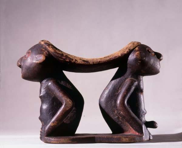 Twa pygmy headrest supported by male and female figures