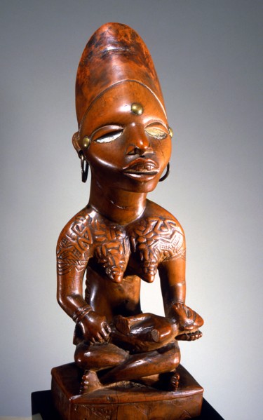 Mother and child carving (phemba) honouring female reproductive power, an idealised image of womens role, and by implication of the growth and wealth of the kingdom