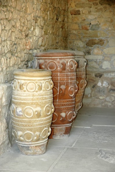 Large vessels or pithoi used for storing oil, grain and fish