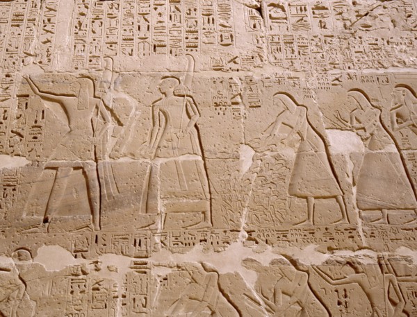 Relief depicting priests scribes and captives being presented to Ramesses III, from his mortuary temple