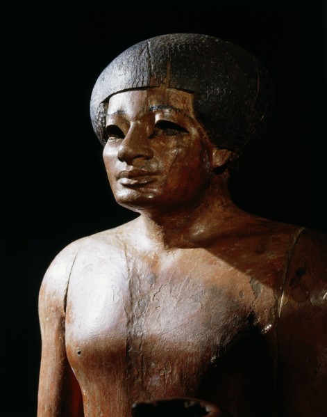 Sculpture of a male figure, thought to be from the funerary temple of Mentuhotep at Deir el Bahari