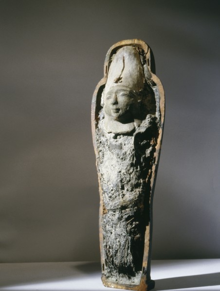 In the mummiform case is contained the body of Osiris, made of earth with germinated grains, symbolising the resurrection of the god