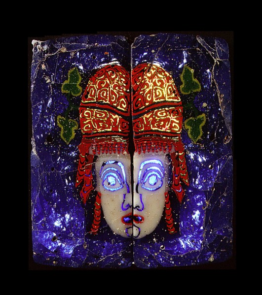 Glass fragment, a hetaira ( courtesan ) theatrical half mask