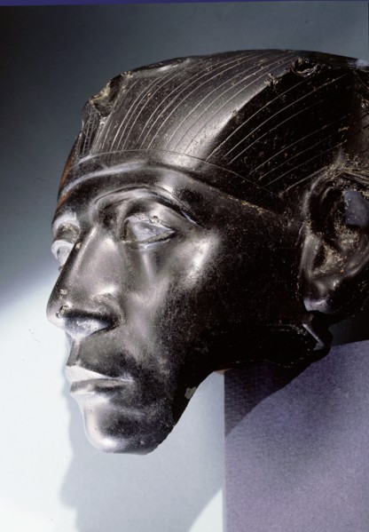 An obsidian head, thought to be part of a statue depicting Senwosret III as a middle aged man