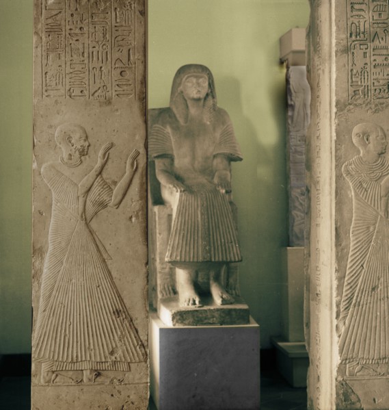 Limestone statue and two pillars with reliefs of adorants from the tomb of Ptahmose, priest in the temple of Ptah