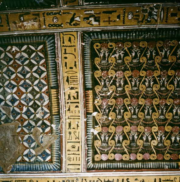 Detail of the geometrical patterns and Hathor heads covering the ceiling of the tomb of Inherkha