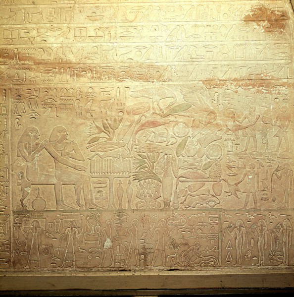Stela showing the tomb owner with his wife and assorted offerings