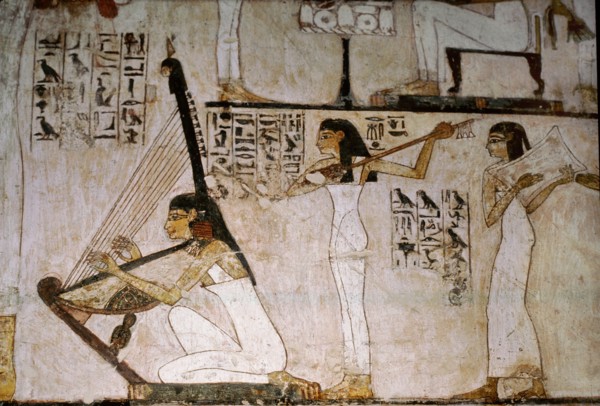 A detail of a wall painting in the tomb of Rekhmire showing women playing the harp, lute and tambourine