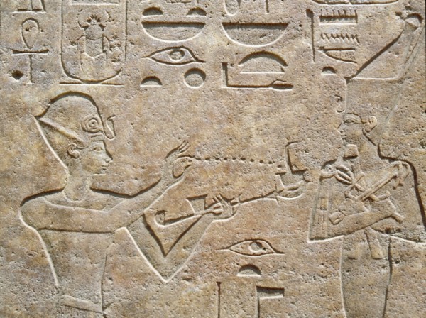 Detail of a relief showing Queen Hatshepsut burning incense to honour a god