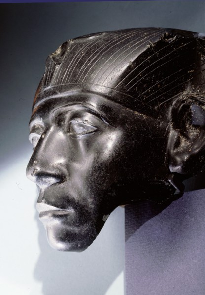 An obsidian head, thought to be part of a statue depicting Senwosret III as a middle aged man