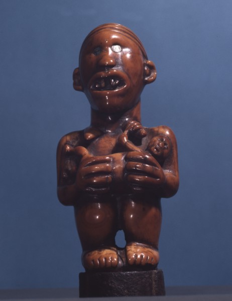 Ivory staff or sceptre finial, a prestige carving for royal or chiefly use, depicting a matrilineal ancestor