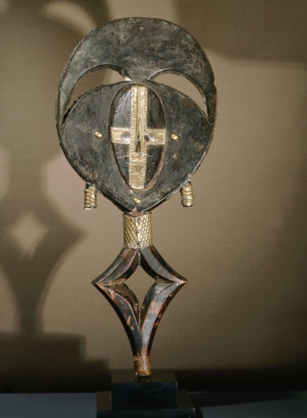 Guardian figures, called mbulu ngulu, are attached to bark boxes or bundles containing bones and other relics of clan or village ancestors, serving to protect them and as a focus for prayers and sacri...