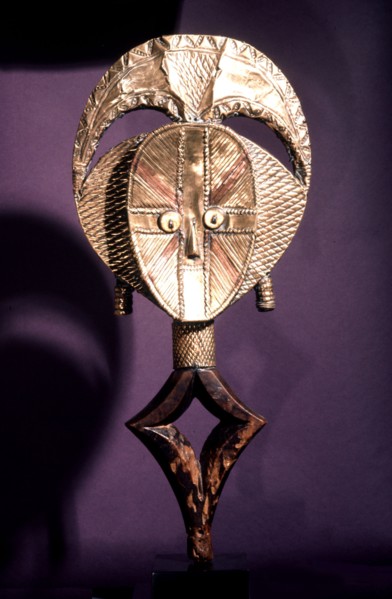 Guardian figures, called mbulu ngulu, are attached to bark boxes or bundles containing bones and other relics of clan or village ancestors, serving to protect them and as a focus for prayers and sacri...