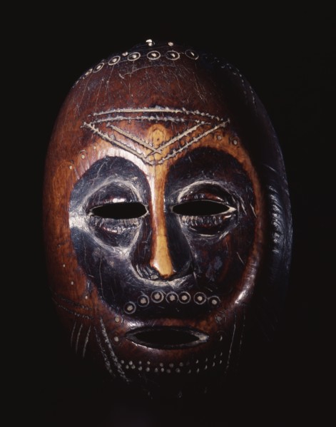 A mask which is not worn but is manipulated and used as a mnemonic device linked with proverbs recited during the initiation rites of the senior grades of the Lega Bwami society