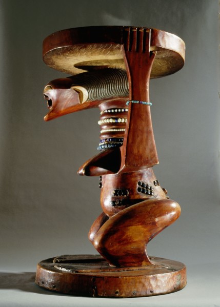 Stool supported by a female figure, served as an emblem of status and prestige for Songye chiefs