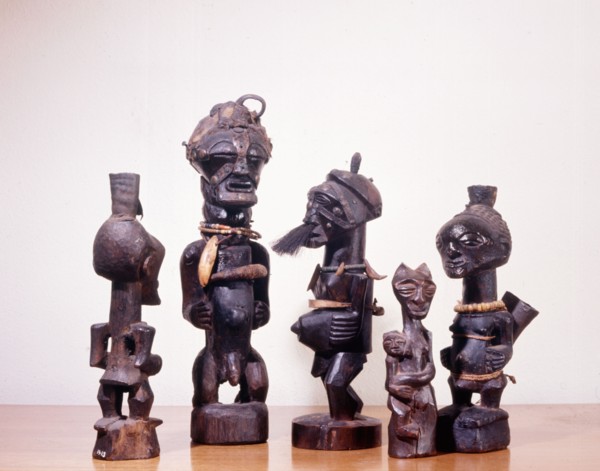 A collection of individual Songye power figures used to heal, to promote fertility, or to attack enemies using attached medicines