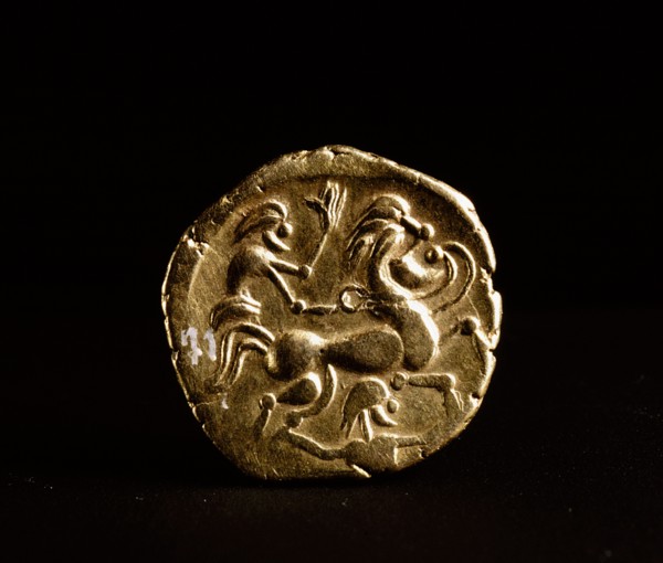 Coin showing a horse and rider
