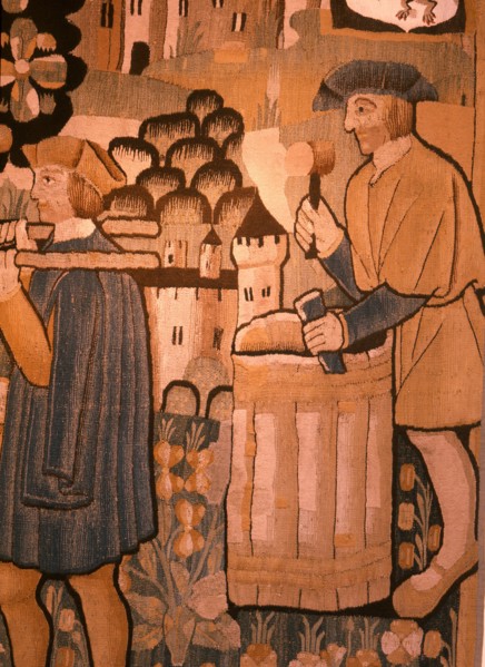 A detail of a tapestry depicting work in the vineyards