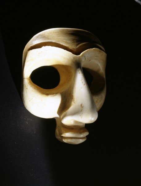 Head, probably from a bearded male votive statuette, with large eye recesses for inlay