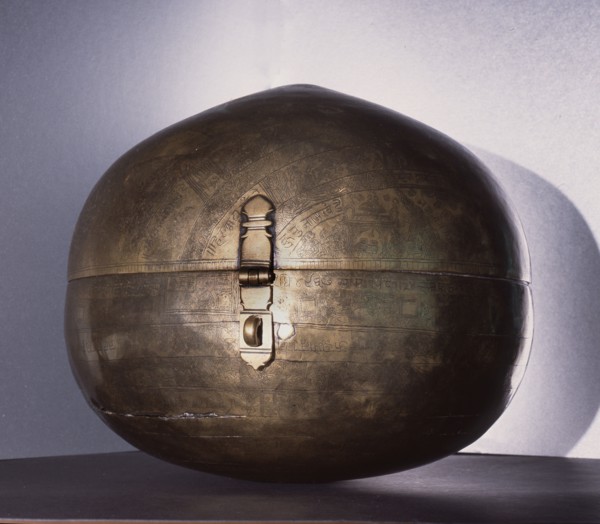 Metalware spherical storage box known as Bhugola or Earth Ball engraved with a representation of the earth as known in Hindu cosmology