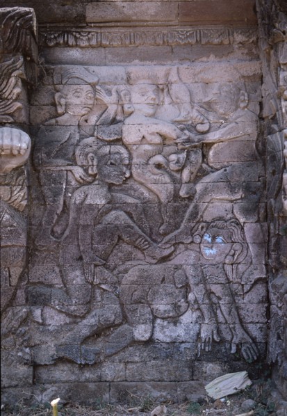 Stone relief on a temple wall at Sangsit, Buleleng