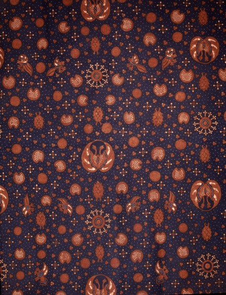 Detail of a batik kain with a design of medallions of birds wings alternating with ships wheels