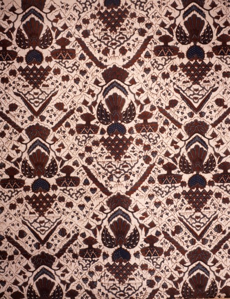 Detail of a batik kain with a design including wings, shrines and sacred mountains