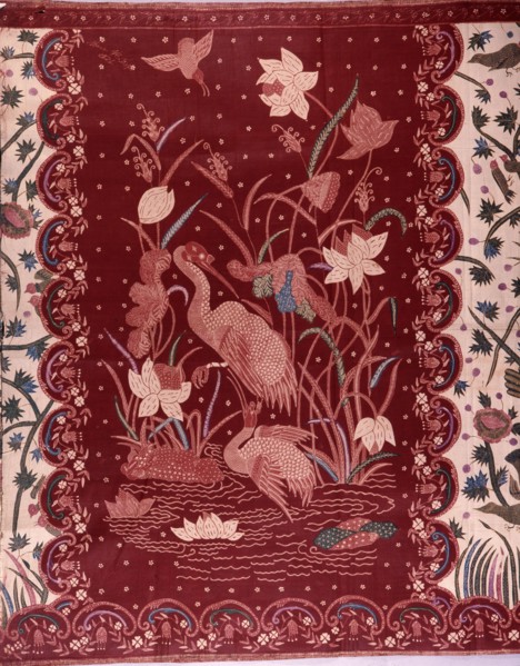 A detail of the design on a batik sarong which incorporates herons and other birds, flowers and water plants