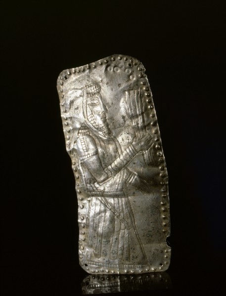 Silver repousse plaque depicting a male figure