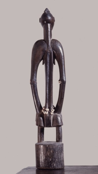 A fine example of a deble, or rhythm pounder, used to beat time for dances held in the sacred grove of the mens society in ceremonies such as funerals