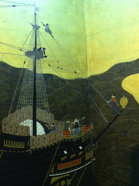 Detail from a folding namban jin or southern barbarian screen depicting a harbour scene recording the arrival of exotic looking Portuguese merchants in Japan