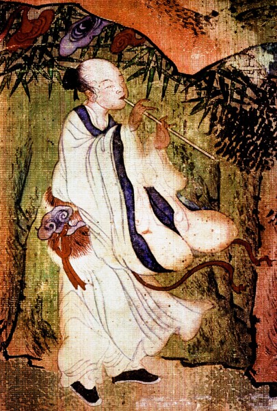 A Taoist Immortal playing a flute in the Tao paradise