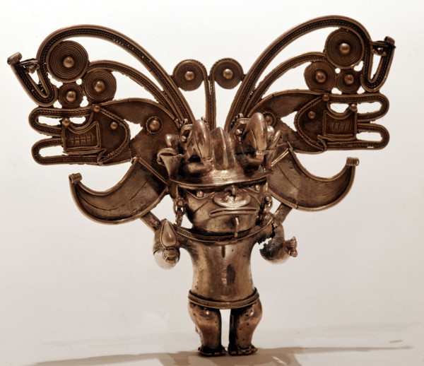 Figure pendant depicting possibly of a nobleman or chief with elaborate headdress known as cacique