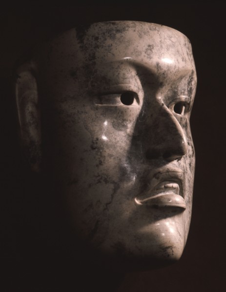 Naturalistic face mask with pierced eyes