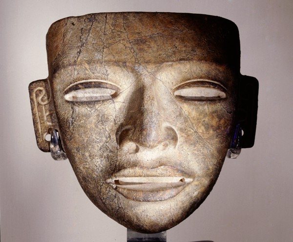 Stone funerary mask, placed on the face of an important corpse as part of the burial attire