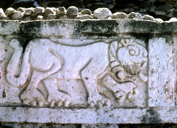 View of a bas relief Jaguar forming part of the enclosing decorative frieze on the northern side of the Pyramid of Quetzalcoatl