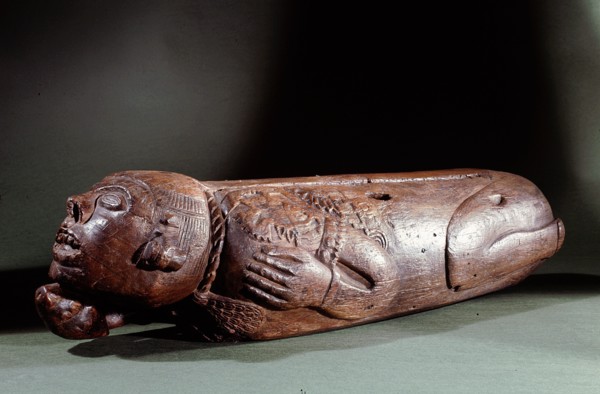 Teponaztli   two toned drum   in the form of a bound captive, probably a sacrificial victim