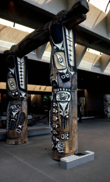 Two front house posts in the form of sea lions support the main beam of the house in the form of Sisiutl, the double headed serpent