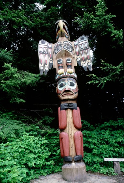 Totem pole with eagle and human crests