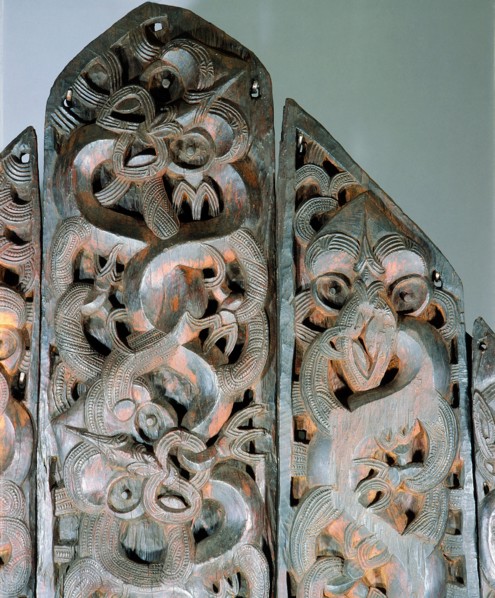 Five carved wooden end panels from a storehouse