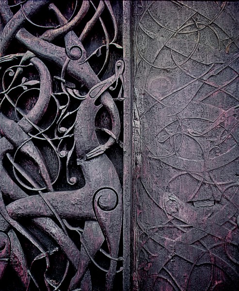Detail of the carving on the side of the stave church at Urnes