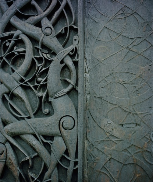 Detail of the carving on the side of the stave church at Urnes