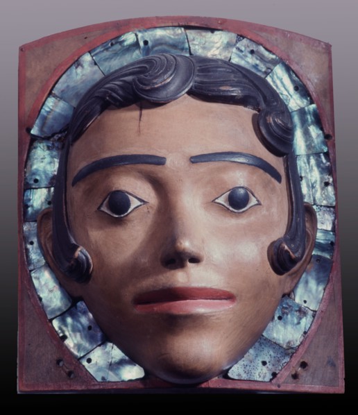 A dance headdress representing a spirit, possibly of a white woman