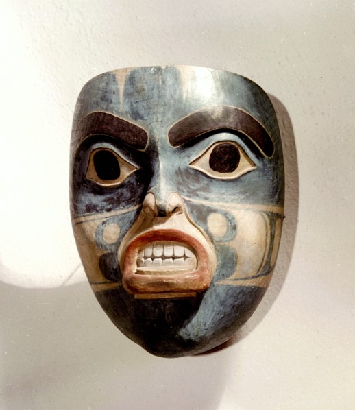 Wooden mask of a woman wearing a labret