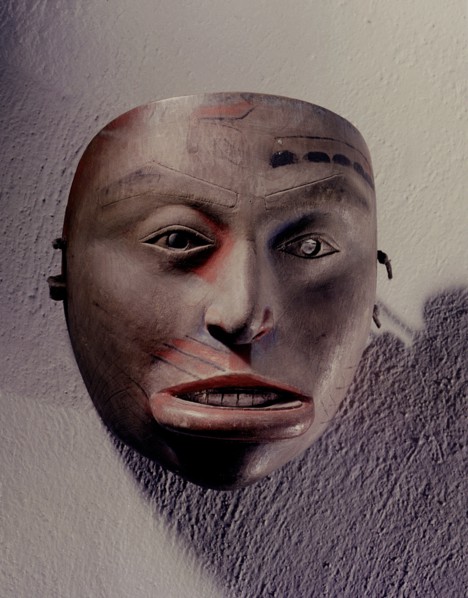 Shamans mask in the form of a womans face with inset mouth