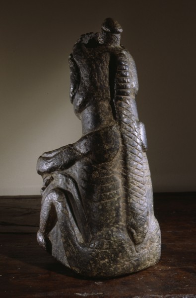 Stone human figure bowl, thought to have been used by Salish shamans in purification rites as part of ceremonies marking the onset of female puberty